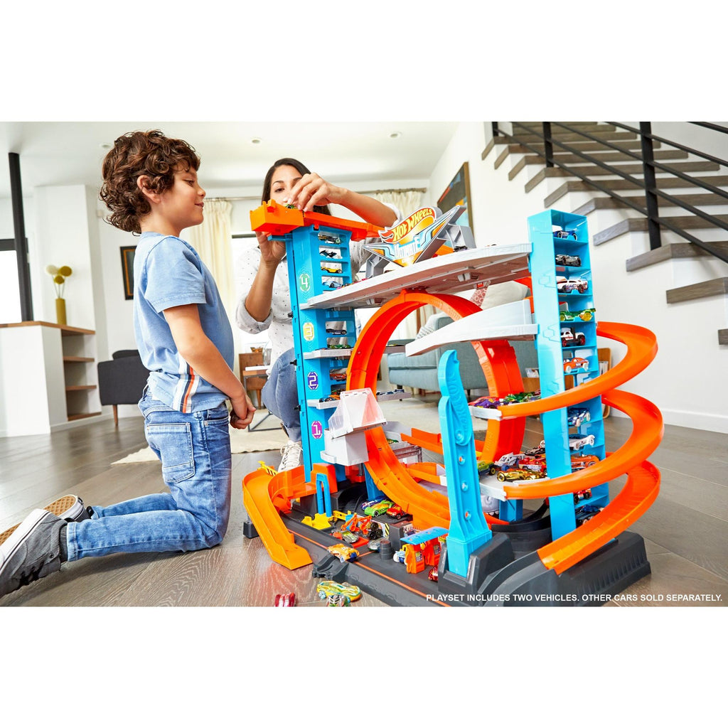 Hot Wheels Ultimate Garage Tower Shark Loop Racetrack, 2 Vehicles